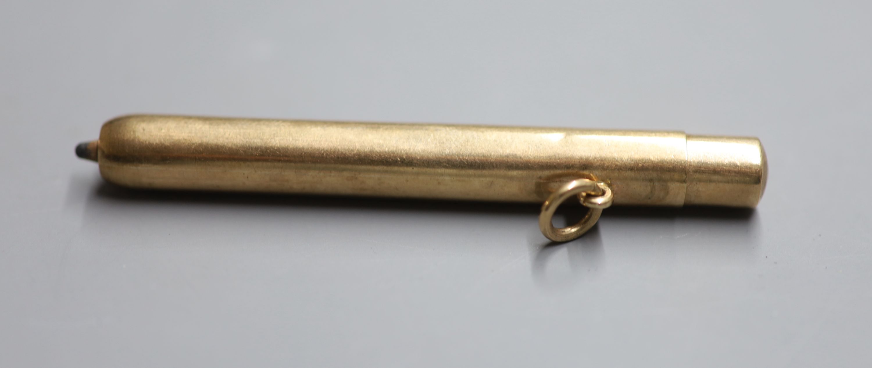 A George V 9ct gold cased pencil by Sampson Mordan & Co, 75mm, gross 18.3 grams.